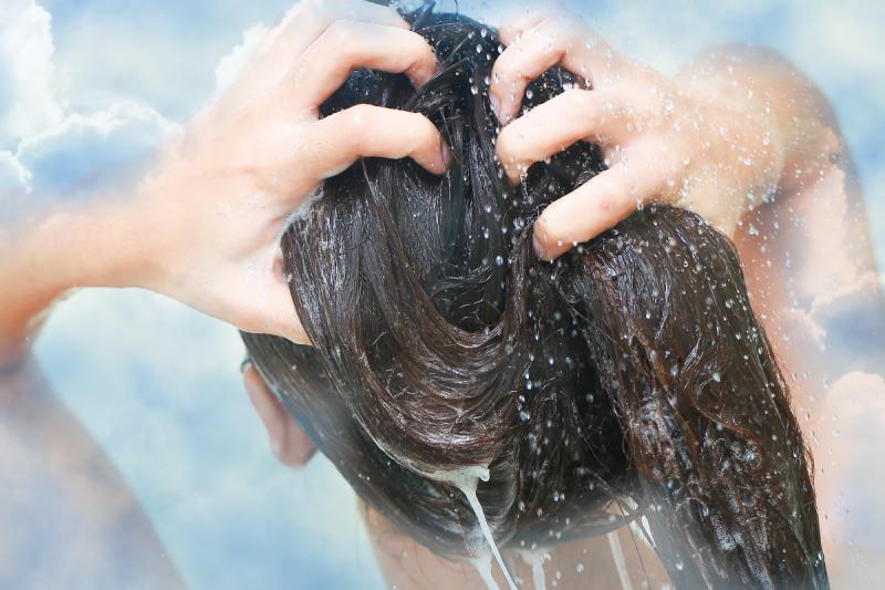 Washing hair outside slow motion pic